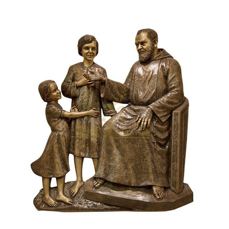 Outdoor Decorated With A Seated Bronze Statue Of St Padre Pio
