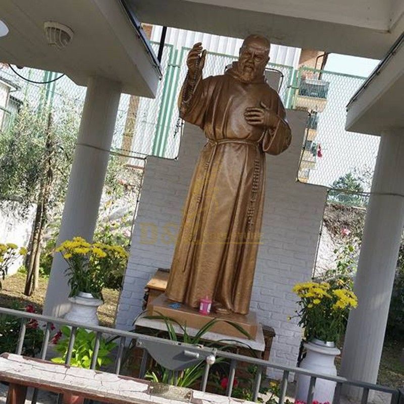 Outdoor bronze statue of Saint Padre Pio used for garden decoration