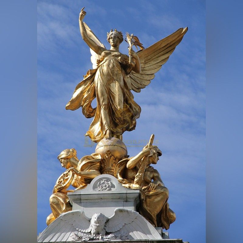 Outdoor angel statue famous golden sculpture bronze Queen Victoria Memorial in London