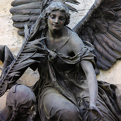 sitting angel sculpture