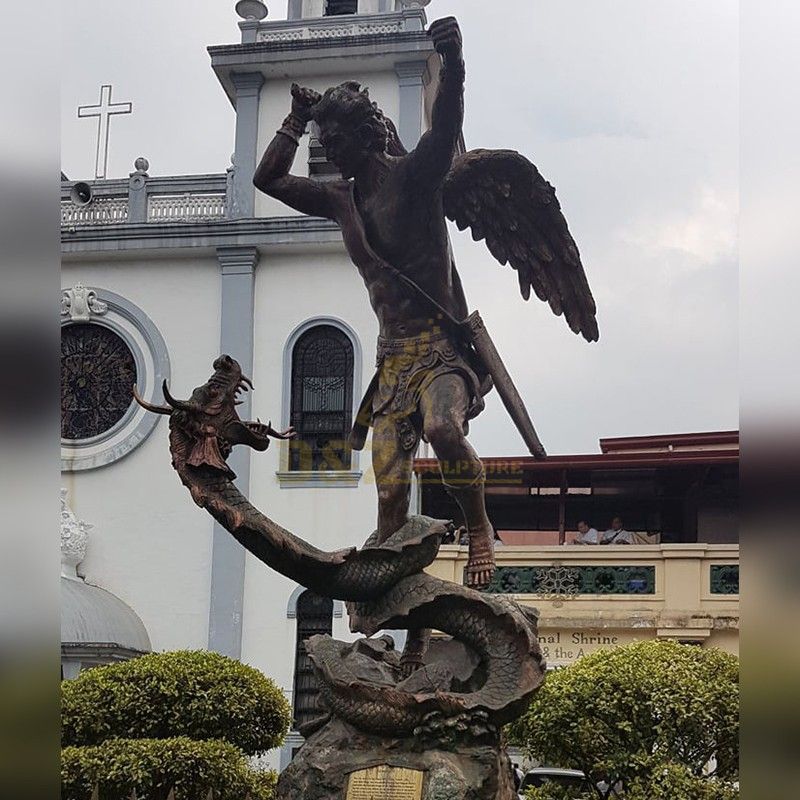 Archangel Saint Michael fighting a dragon garden statue for sale