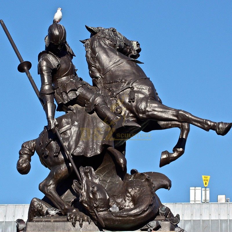 Religious sculpture Saint George riding a horse to slay a dragon statue for sale