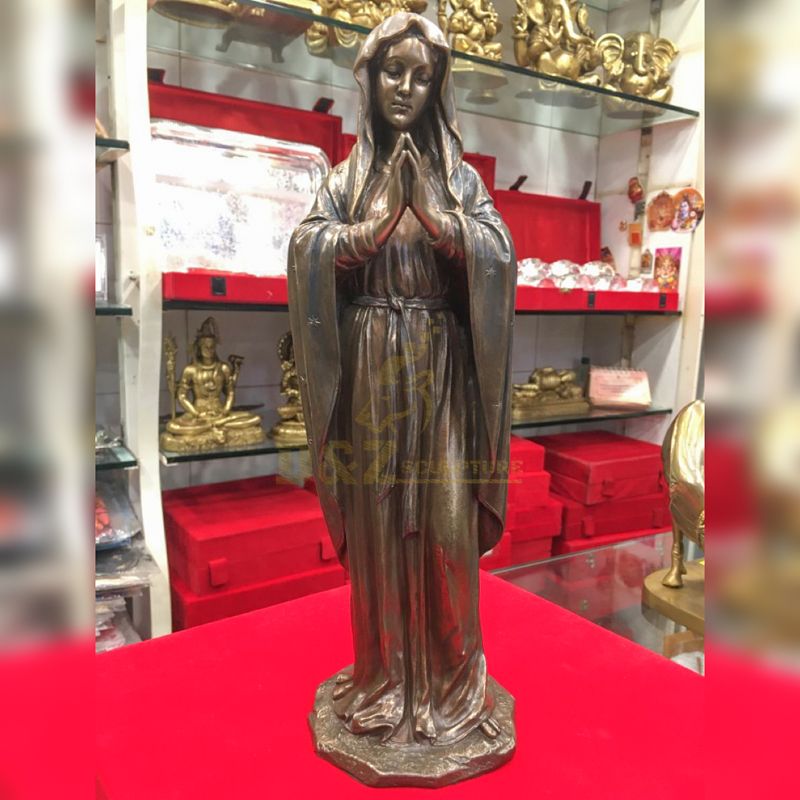 bronze Virgin Mary prayer statue